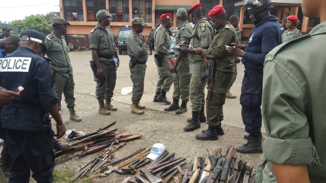 Cameroonian security forces confiscating farming tools